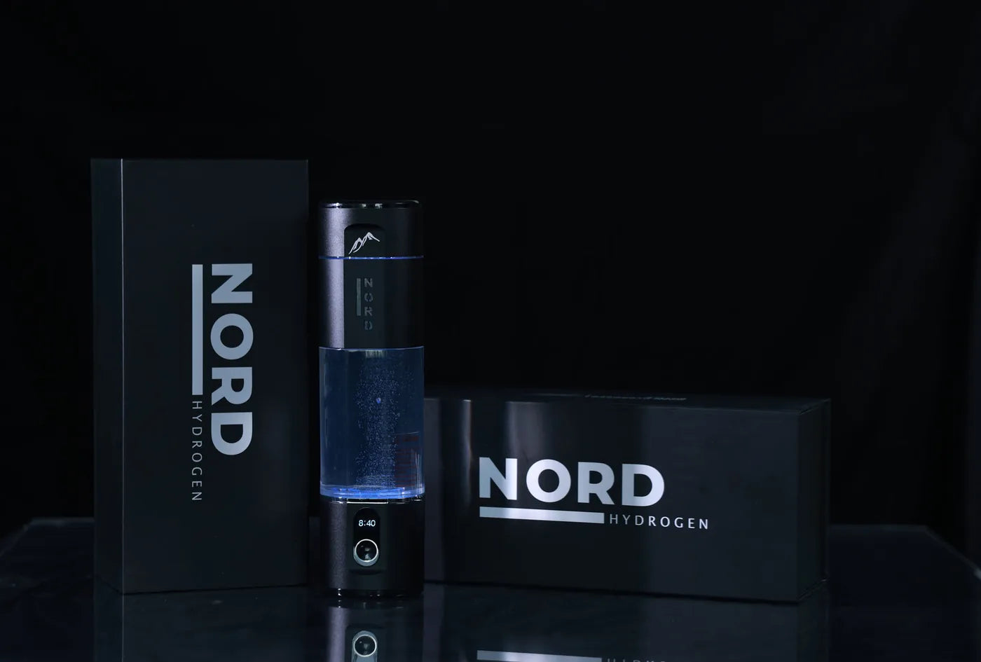 Bottle next to its box