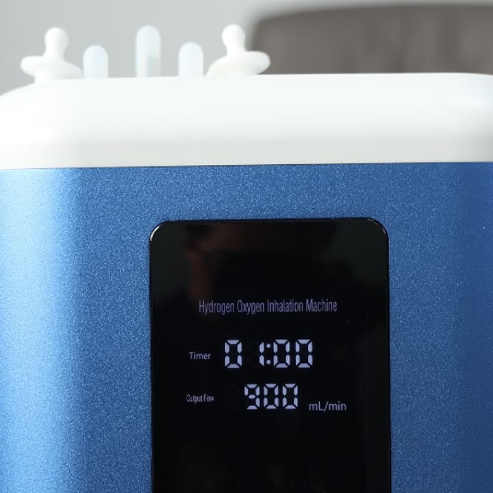 Display showing 900 mL/min and the session timer